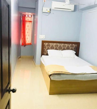 Imagen de la habitación del Hotel Emerald Homes. Foto 13