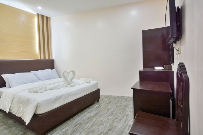 Imagen de la habitación del Hotel Emerald Island. Foto 9