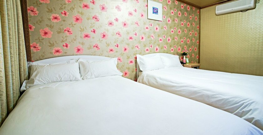 Imagen de la habitación del Hotel Emerald, Jeju. Foto 19