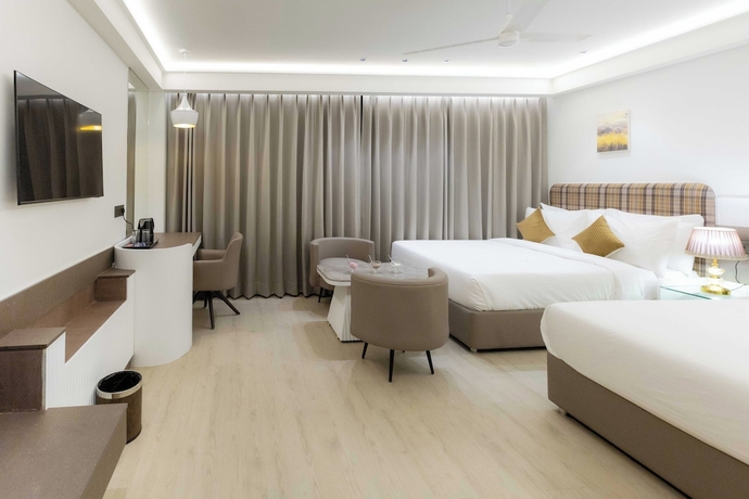 Imagen de la habitación del Hotel Emerald Luxe A Boutique. Foto 2
