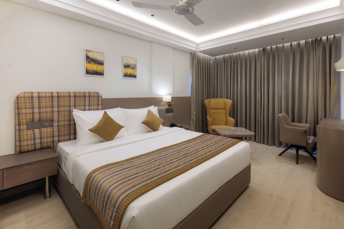 Imagen de la habitación del Hotel Emerald Luxe A Boutique. Foto 8