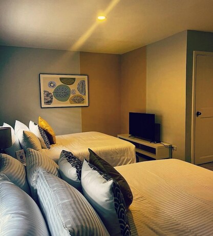 Imagen de la habitación del Hotel Emerald Manor. Foto 12