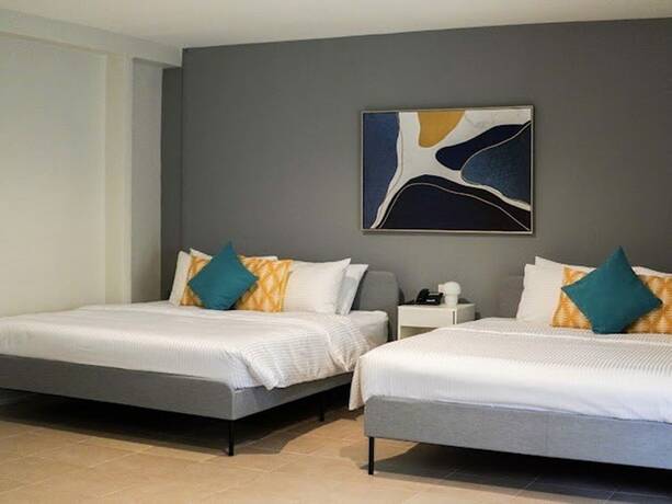 Imagen de la habitación del Hotel Emerald Manor. Foto 23