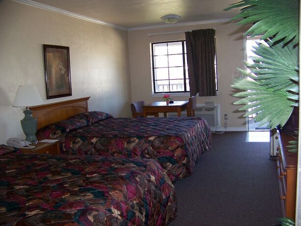 Imagen de la habitación del Hotel Emerald Sands Inn. Foto 10