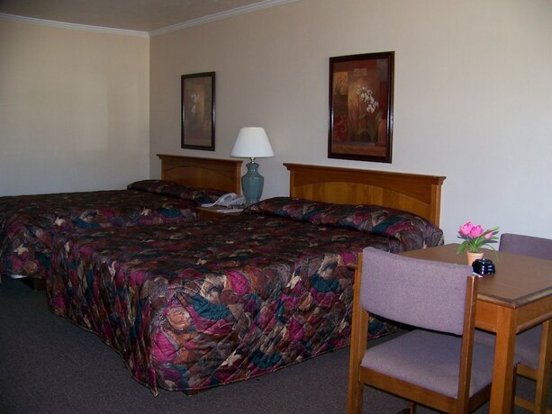 Imagen de la habitación del Hotel Emerald Sands Inn. Foto 13