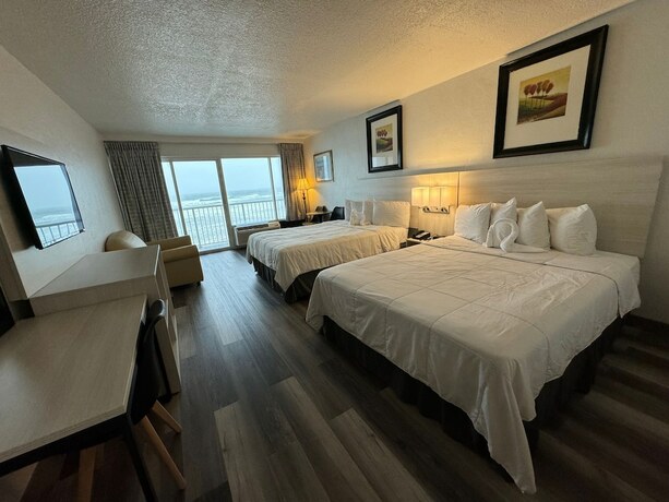 Imagen de la habitación del Hotel Emerald Shores Resort. Foto 18