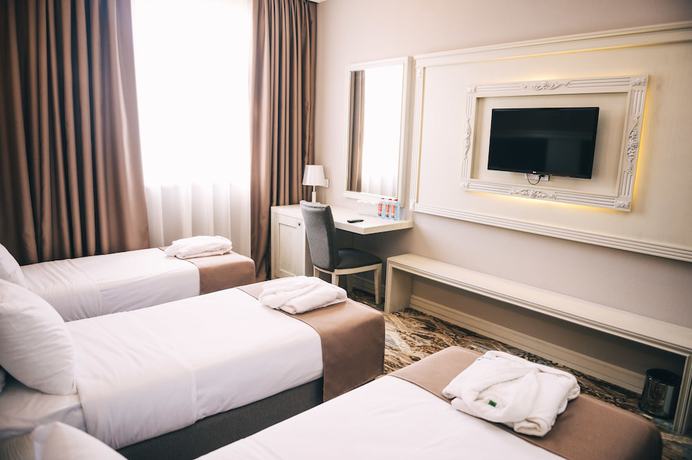 Imagen de la habitación del Hotel Emerald Suite. Foto 5