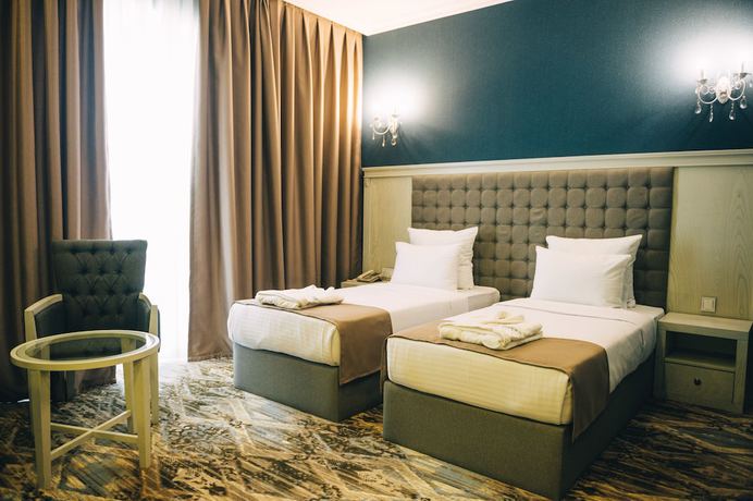 Imagen de la habitación del Hotel Emerald Suite. Foto 11