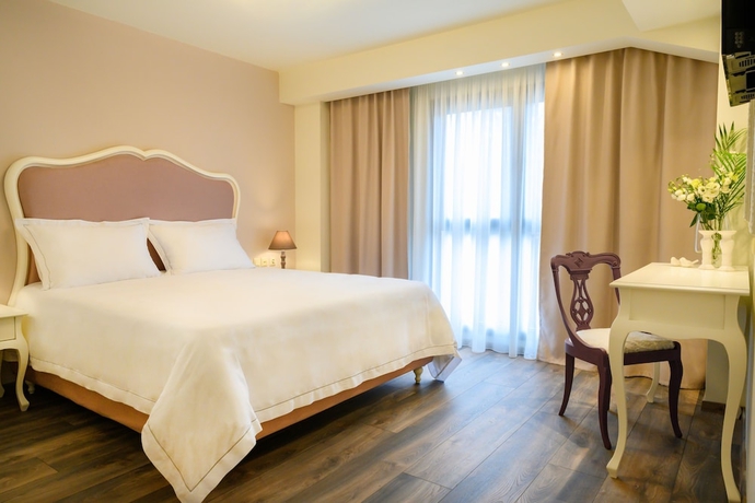 Imagen de la habitación del Hotel Emerald Suites. Foto 2