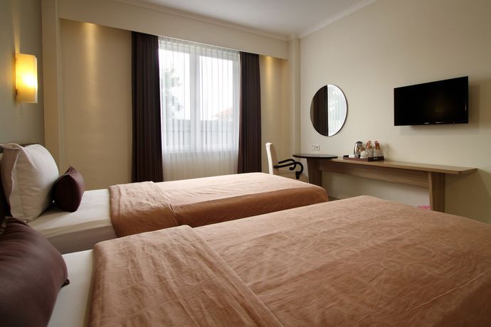 Imagen de la habitación del Hotel Emersia Malioboro. Foto 7