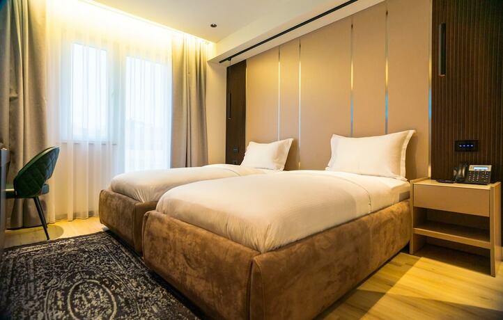 Imagen de la habitación del Hotel Emery. Foto 14