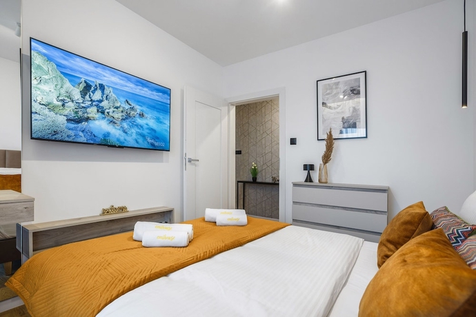 Imagen de la habitación del Hotel Emihouse Riverside Apartments. Foto 9