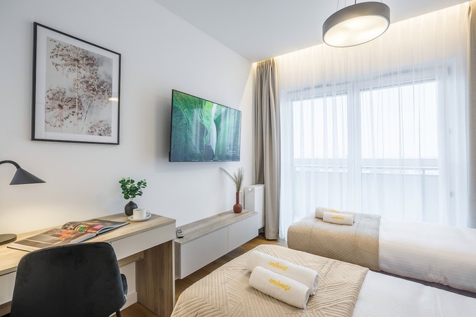 Imagen de la habitación del Hotel Emihouse Riverside Apartments. Foto 12