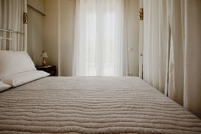 Imagen de la habitación del Hotel Emilia Luxury Apartments. Foto 6