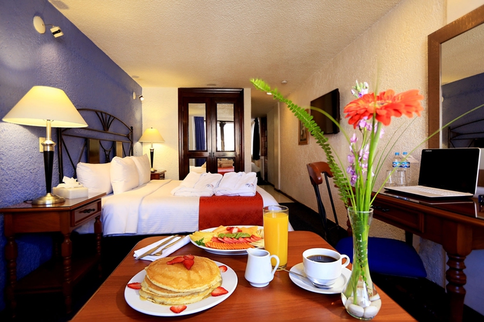 Imagen de la habitación del Hotel Emily. Foto 6