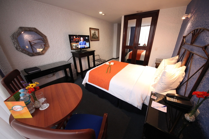 Imagen de la habitación del Hotel Emily. Foto 9