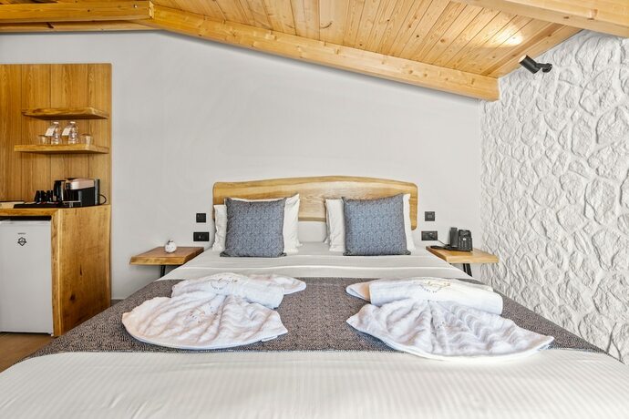 Imagen de la habitación del Hotel Emily\'s Luxury Suites. Foto 12