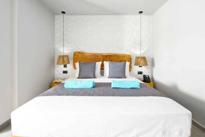 Imagen de la habitación del Hotel Emily\'s Luxury Suites. Foto 16