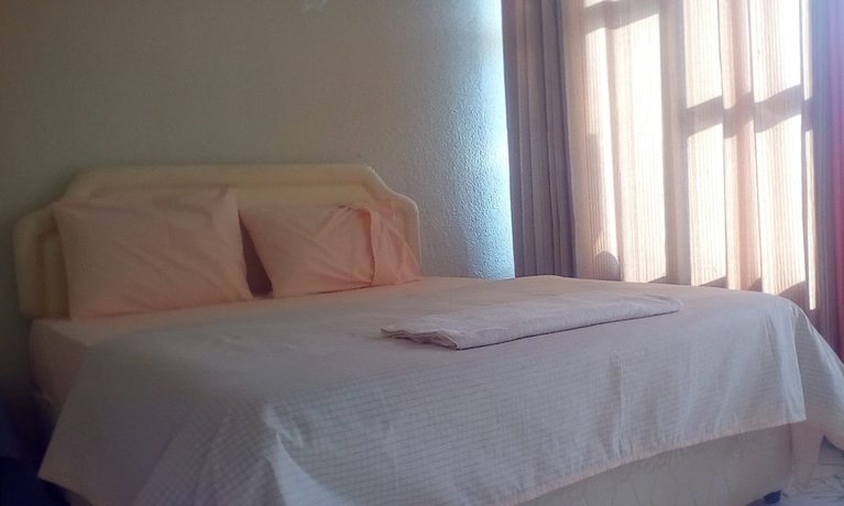 Imagen de la habitación del Hotel Eminence, Kigali. Foto 12