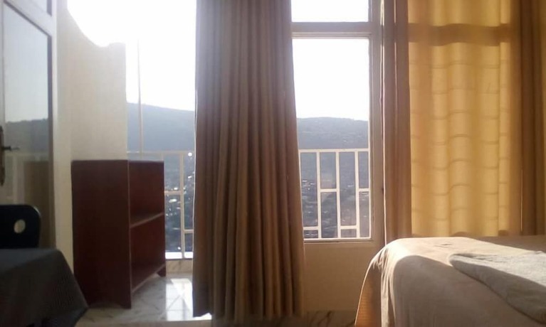 Imagen de la habitación del Hotel Eminence, Kigali. Foto 18