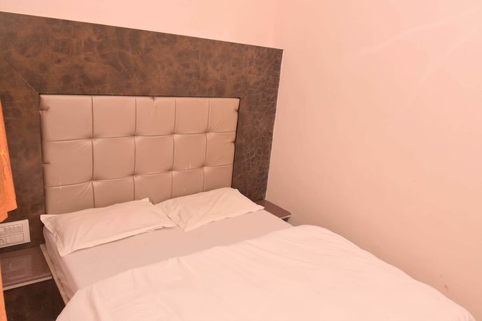 Imagen de la habitación del Hotel Eminence - Palm Residency. Foto 11
