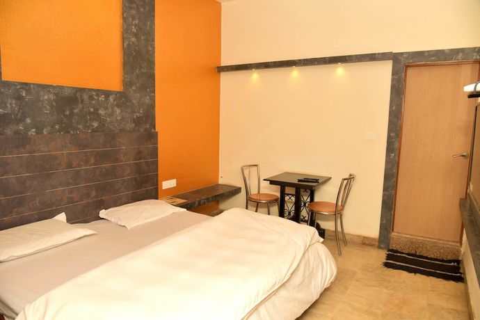 Imagen de la habitación del Hotel Eminence - Palm Residency. Foto 13