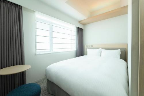 Imagen de la habitación del Hotel Emion Sapporo. Foto 12
