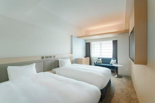 Imagen de la habitación del Hotel Emion Sapporo. Foto 14