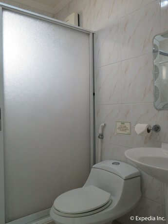 Imagen de la habitación del Hotel Emiramona Garden Hotel. Foto 11