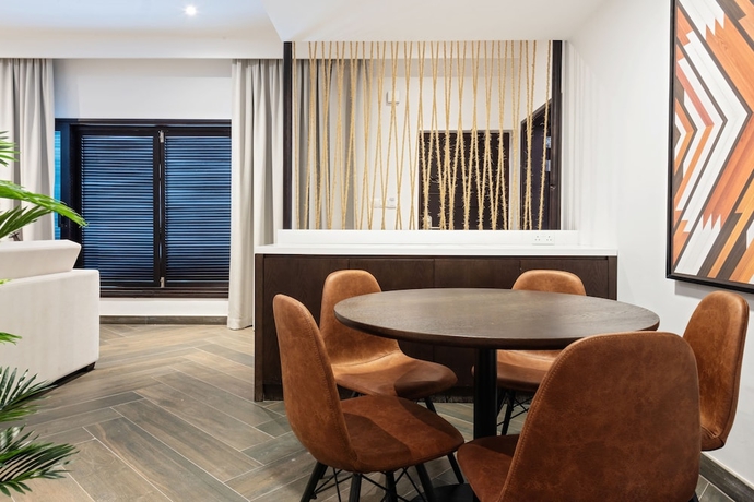 Imagen de la habitación del Hotel Emirates Park Resort. Foto 7