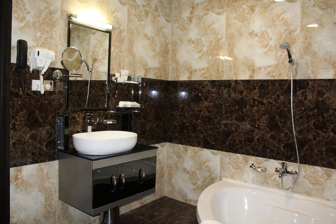 Imagen de la habitación del Hotel Emirates Park Resort. Foto 16