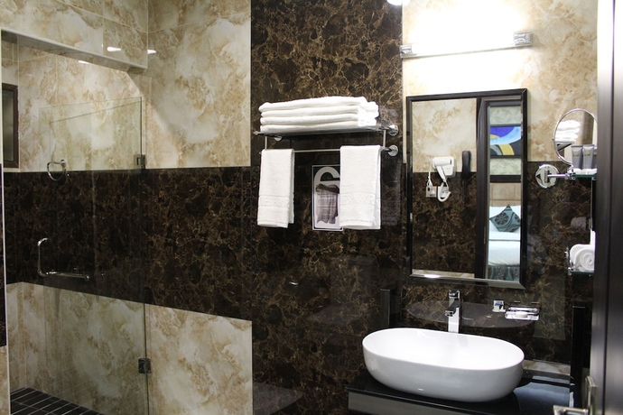 Imagen de la habitación del Hotel Emirates Park Resort. Foto 17