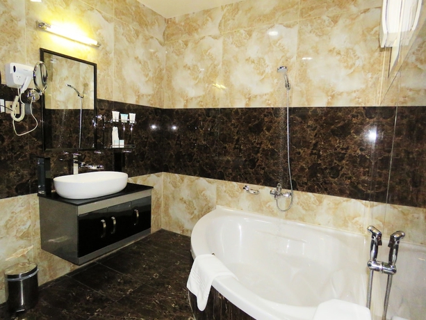 Imagen de la habitación del Hotel Emirates Park Resort. Foto 18