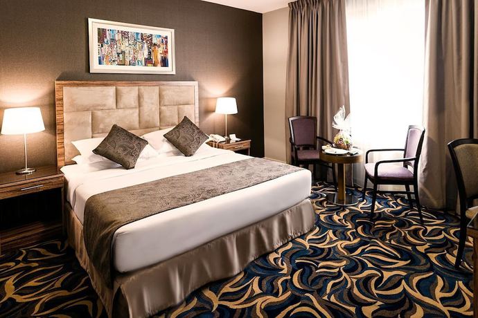 Imagen de la habitación del Hotel Emirates Plaza, Abu Dhabi. Foto 11