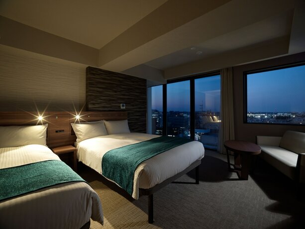 Imagen de la habitación del Hotel Emisia Tokyo Tachikawa. Foto 20