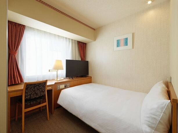 Imagen de la habitación del Hotel Emisia Tokyo Tachikawa. Foto 23