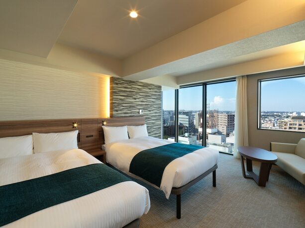 Imagen de la habitación del Hotel Emisia Tokyo Tachikawa. Foto 25