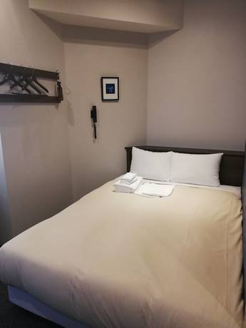 Imagen de la habitación del Hotel Emit Ueno. Foto 16