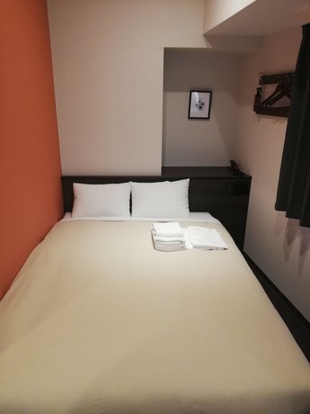 Imagen de la habitación del Hotel Emit Ueno. Foto 17