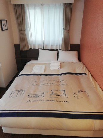 Imagen de la habitación del Hotel Emit Ueno. Foto 19