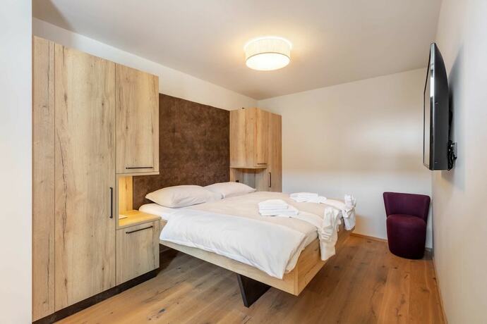 Imagen de la habitación del Hotel Emma Deluxe. Foto 11