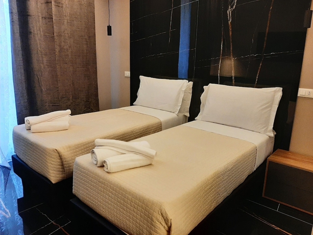 Imagen de la habitación del Hotel Emma Fiera. Foto 10