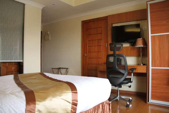 Imagen de la habitación del Hotel Emmad Apartment. Foto 7