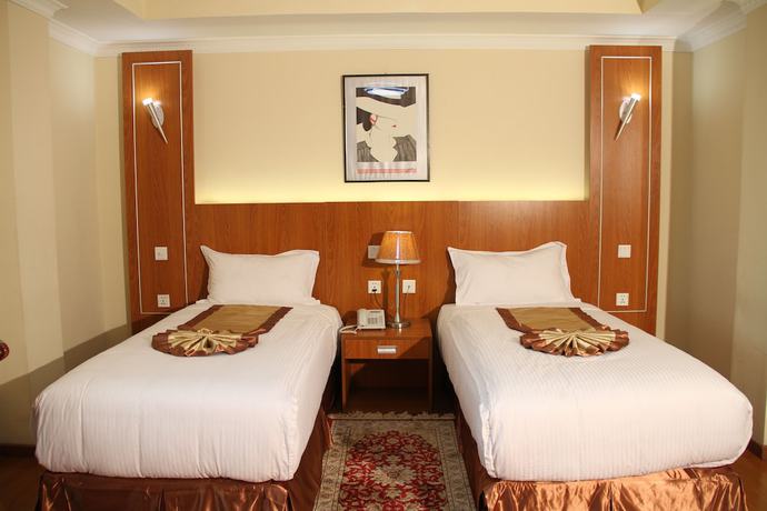 Imagen de la habitación del Hotel Emmad Apartment. Foto 14