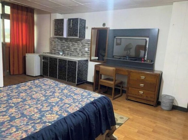 Imagen de la habitación del Hotel Emmad Apartment. Foto 15