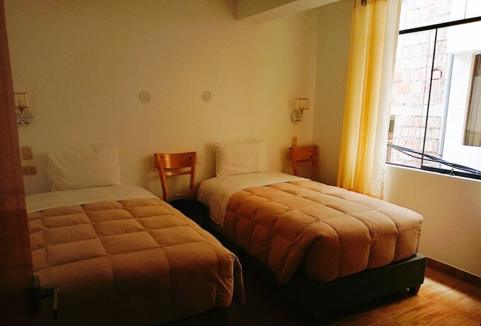 Imagen de la habitación del Hotel Emmanuel Inn Machupicchu. Foto 8