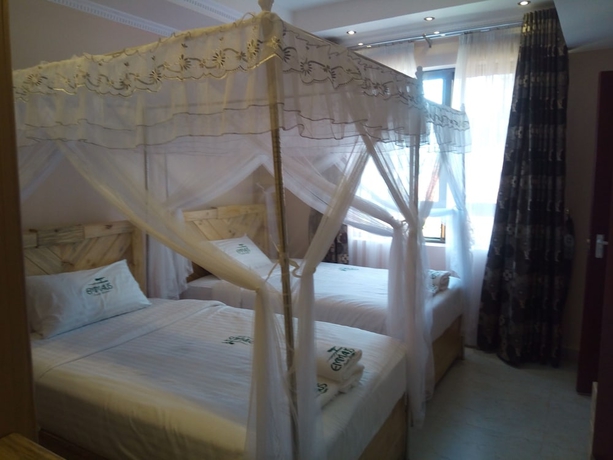 Imagen de la habitación del Hotel Emmaus Guest House. Foto 12