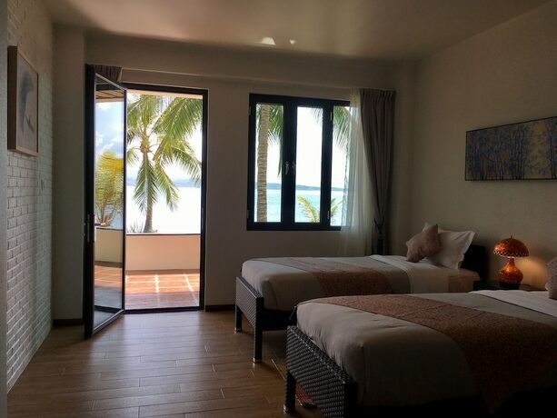Imagen de la habitación del Hotel Emoha Dive Resort. Foto 11