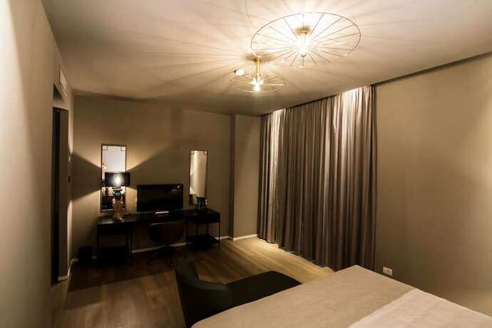 Imagen de la habitación del Hotel Emotional Grand Motel. Foto 15