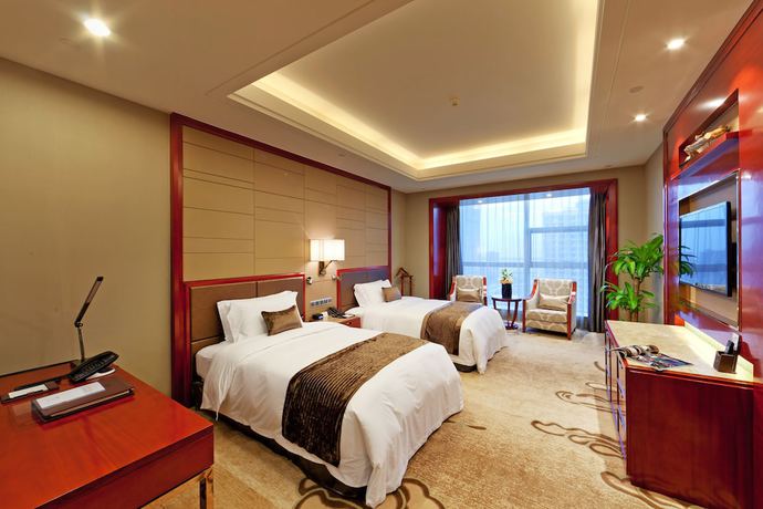 Imagen de la habitación del Hotel Empark Grand Hangzhou Bay Ningbo. Foto 2